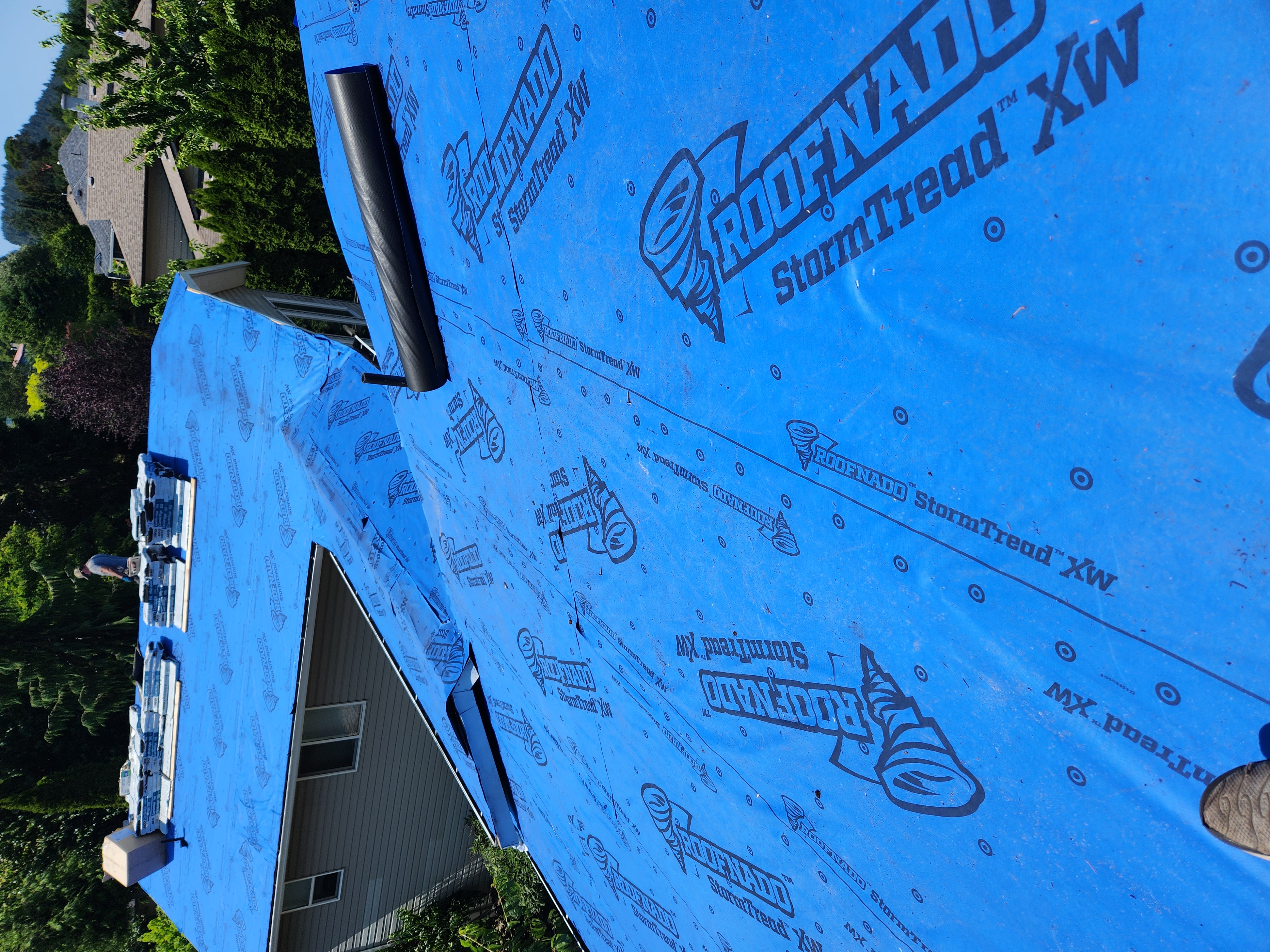 Close-up of roof underlayment installation